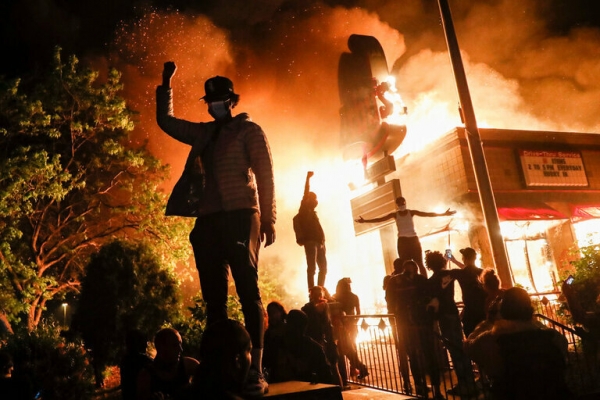 Джон Минчилло/Associated Press